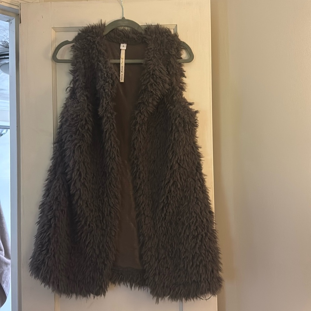 Uncle Frank, fuzzy vest. Dark grey, size small.
